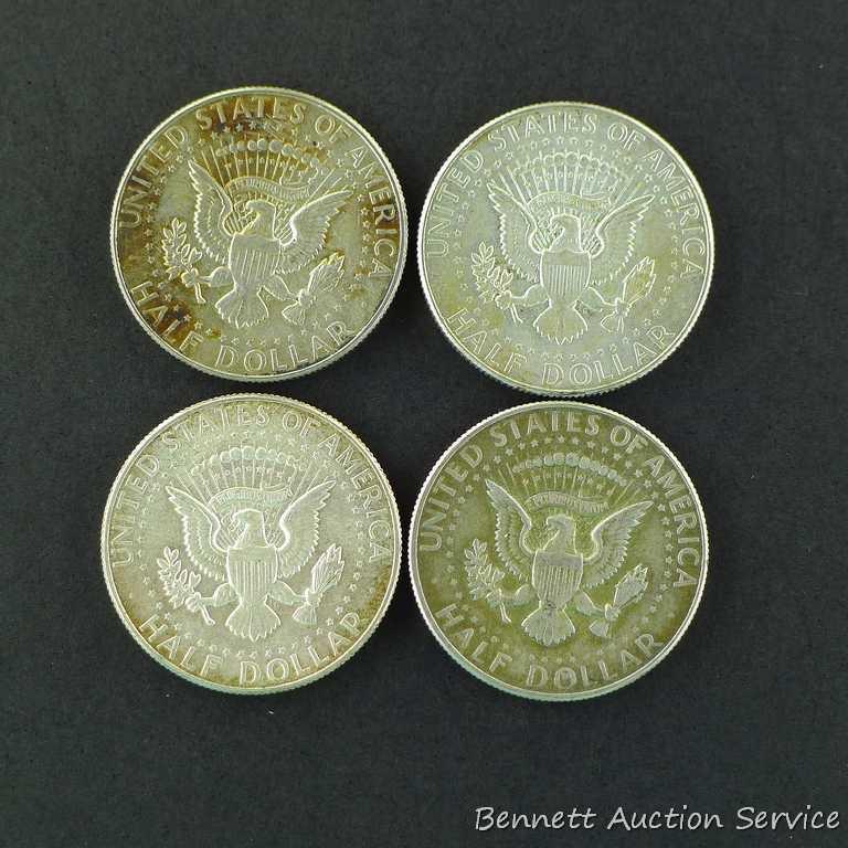 Ten 1965 through 1969 Kennedy silver clad half dollars