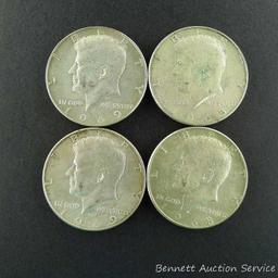 Ten 1965 through 1969 Kennedy silver clad half dollars