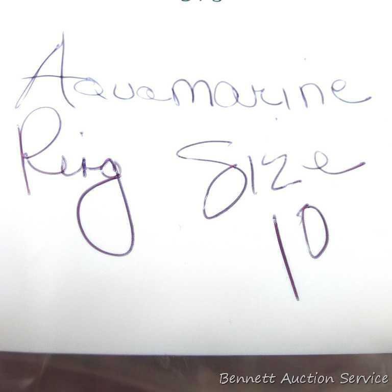 Seller's description states 'aquamarine ring, size 10'.