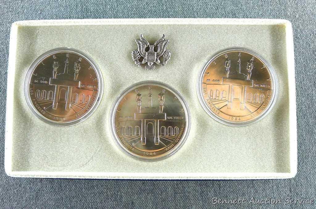 1984 P.D.S. uncirculated Olympic silver dollars.