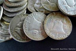 28 Franklin silver half dollars, 1948-1963 with gaps in dates.