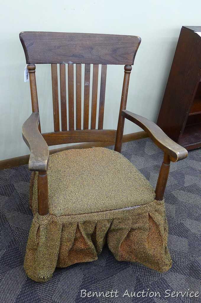 Sturdy vintage wooden rocking chair. Approx. 37" h x 21" deep (to back of chair). Cushion is springy