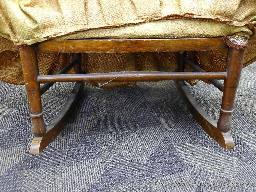 Sturdy vintage wooden rocking chair. Approx. 37" h x 21" deep (to back of chair). Cushion is springy