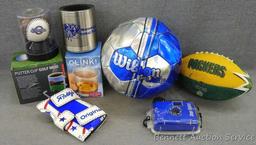 Putter Cup Golf Mug; decorative Brewers ball; Wilson Fuse ball; Packer football, needs air; more.