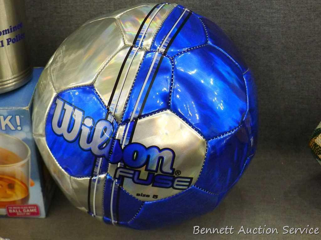 Putter Cup Golf Mug; decorative Brewers ball; Wilson Fuse ball; Packer football, needs air; more.