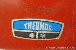 Vintage Thermos cooler. Approx. 21-1/2" l x 13" w x 15" h. Inside has some discoloration. Shows