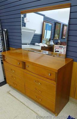 Beautiful vintage six dresser with mirror. Measures approx. 50"l x 18" w x 62" h. Top finish is