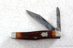 Classic pocket knife by Camillus of New York is 5-3/4" open. Handle slabs are in good condition.