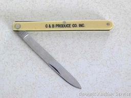 Unsharpened and unused promotional melon knife made in Germany by Murcott. 8-1/2" open. Advertises