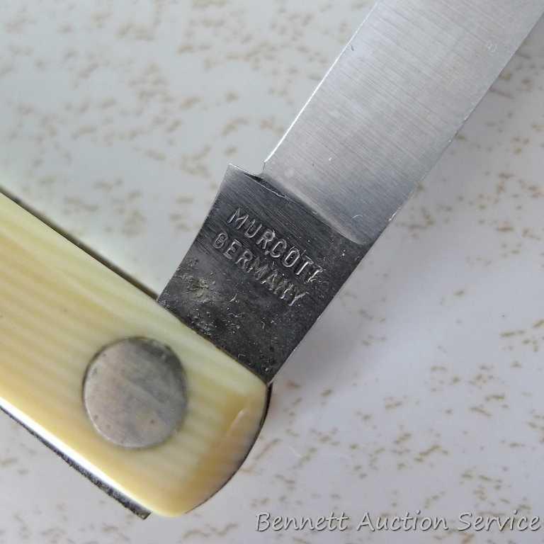 Unsharpened and unused promotional melon knife made in Germany by Murcott. 8-1/2" open. Advertises