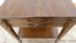 Mersman end table measures approx. 27" x 19" wide x 21" high and has one dove tailed drawer. Table