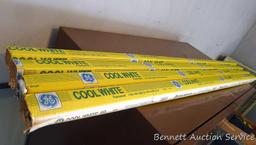 Four 48" General Electric Cool White fluorescent tubes appear NIP.