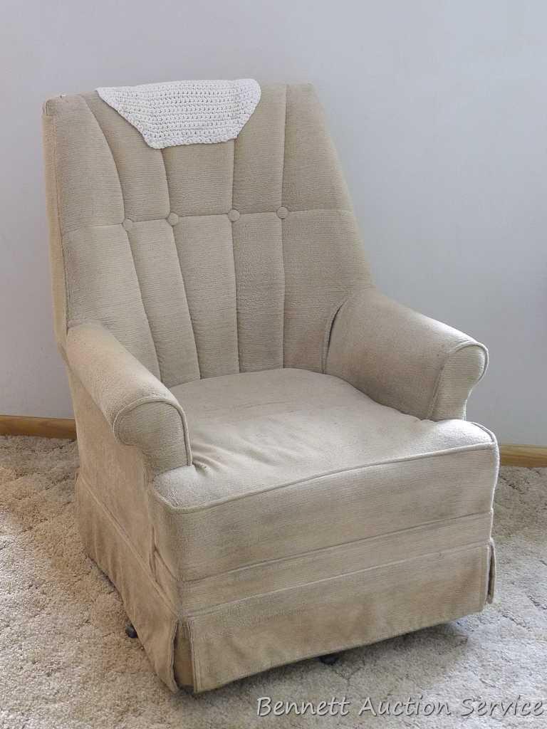 Nice smaller sized swivel rocker in overall good condition. Some light spots and stains noted - may