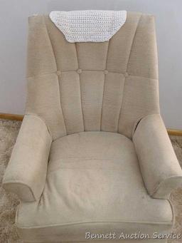 Nice smaller sized swivel rocker in overall good condition. Some light spots and stains noted - may