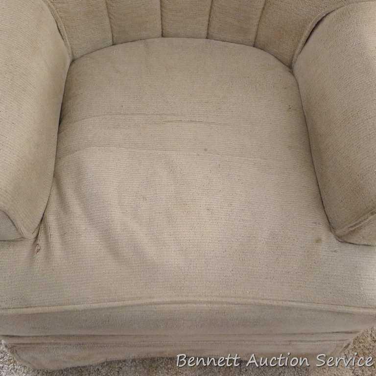 Nice smaller sized swivel rocker in overall good condition. Some light spots and stains noted - may