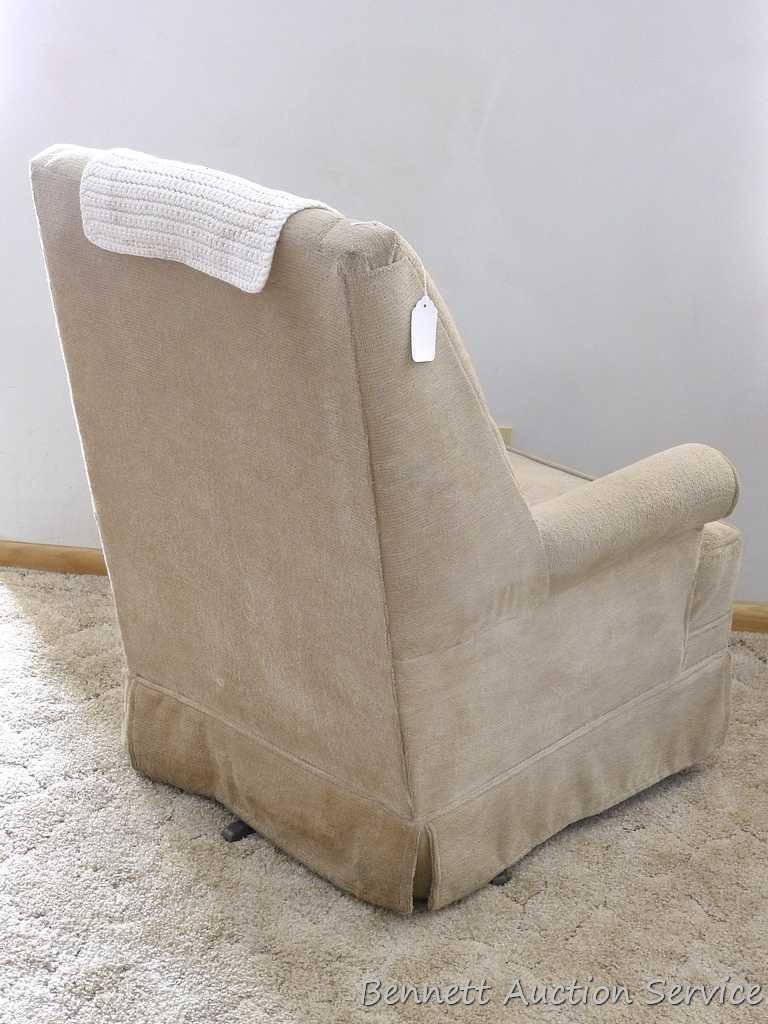 Nice smaller sized swivel rocker in overall good condition. Some light spots and stains noted - may