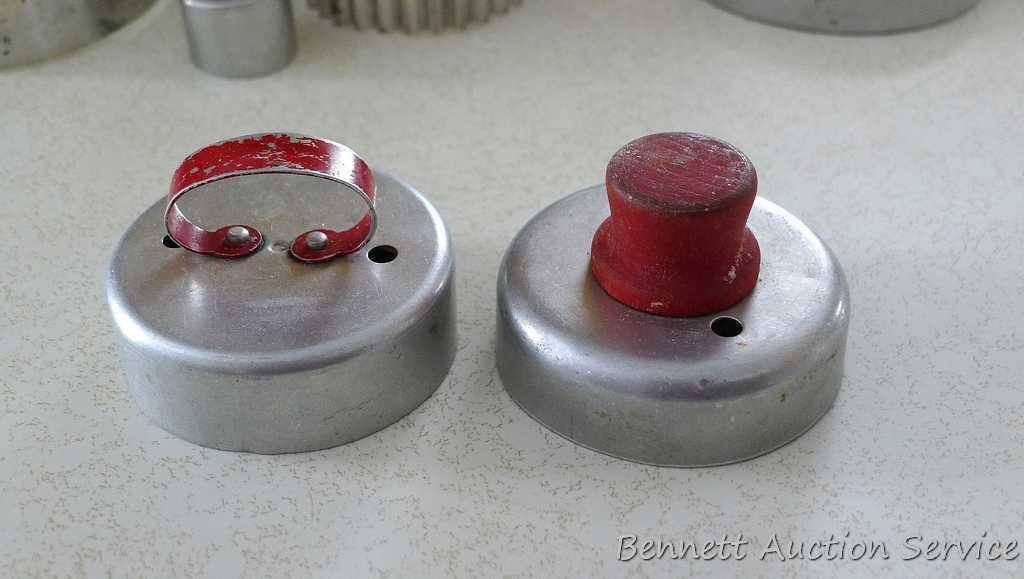 Biscuit and doughnut cutters, plus an aluminum Burger Press by Heuck.