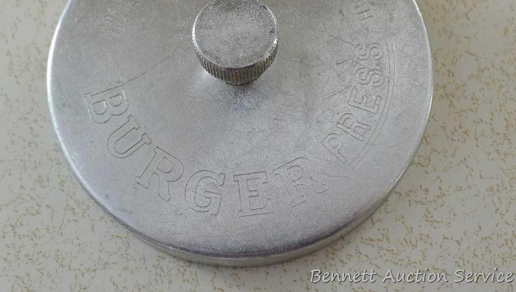 Biscuit and doughnut cutters, plus an aluminum Burger Press by Heuck.