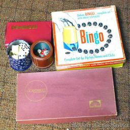 Vintage games and more. Games include Bingo, Scrabble and Dominoes. Dice are also included.