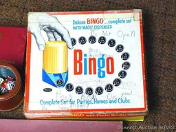 Vintage games and more. Games include Bingo, Scrabble and Dominoes. Dice are also included.