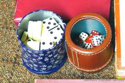 Vintage games and more. Games include Bingo, Scrabble and Dominoes. Dice are also included.