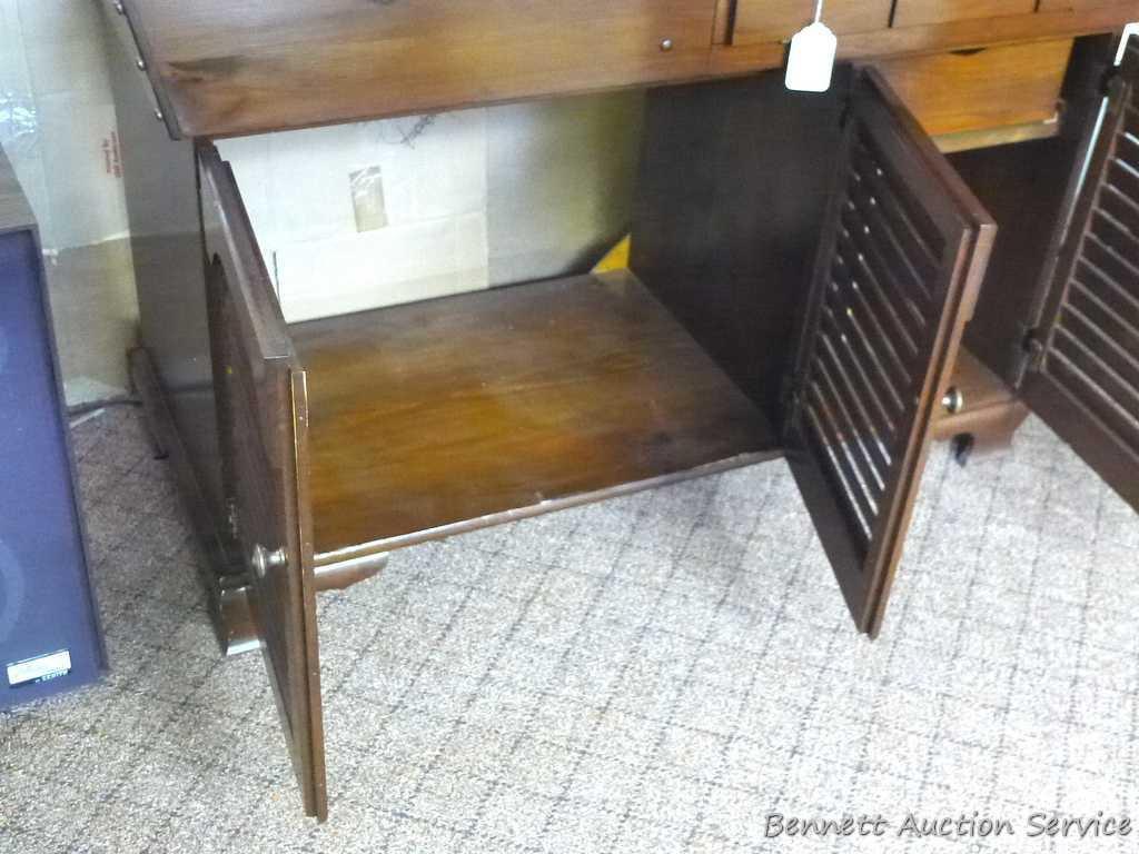 Vintage cabinet that could be used for an entertainment stand. Approx. 46" w x 20" d x 36-1/2" high.