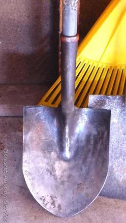 Hand tools including four prong metal fork; spaded shovel with fiberglass handle, flat shovel, hay