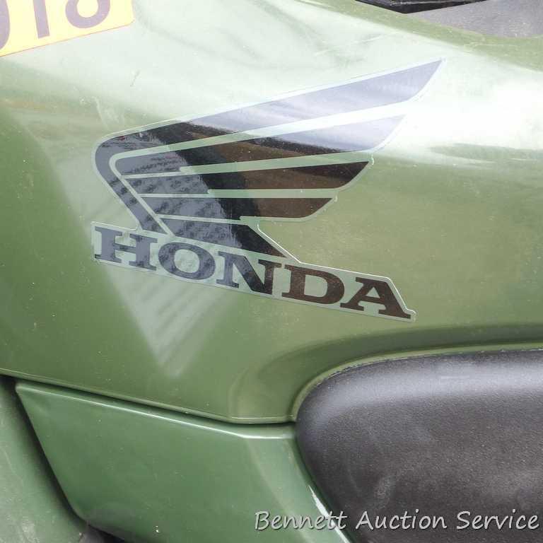 Watch the video: 2014 Honda Rancher AT ATV four-wheeler, fuel injected, winch, only 594 miles.