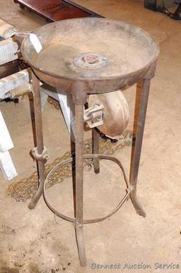 Cast iron blacksmith's forge is 18" diameter and stands 33" tall. Blower had been driven by a flat