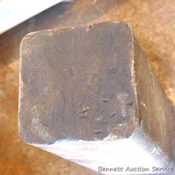 Solid steel block anvil is 4" x 4" x 9".