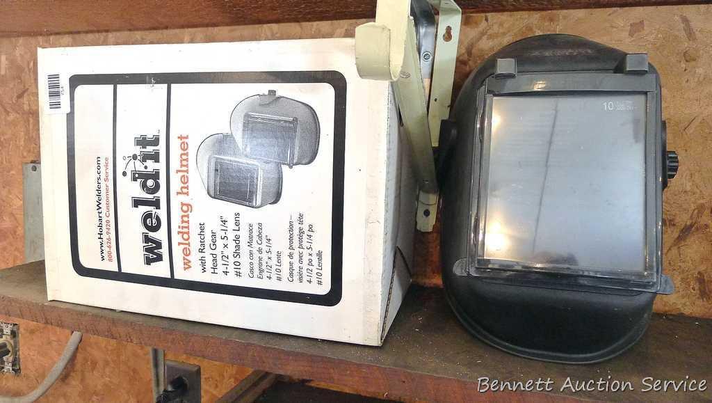 Hobart Weld-It large lens welding helmet with flip up lens and original box.