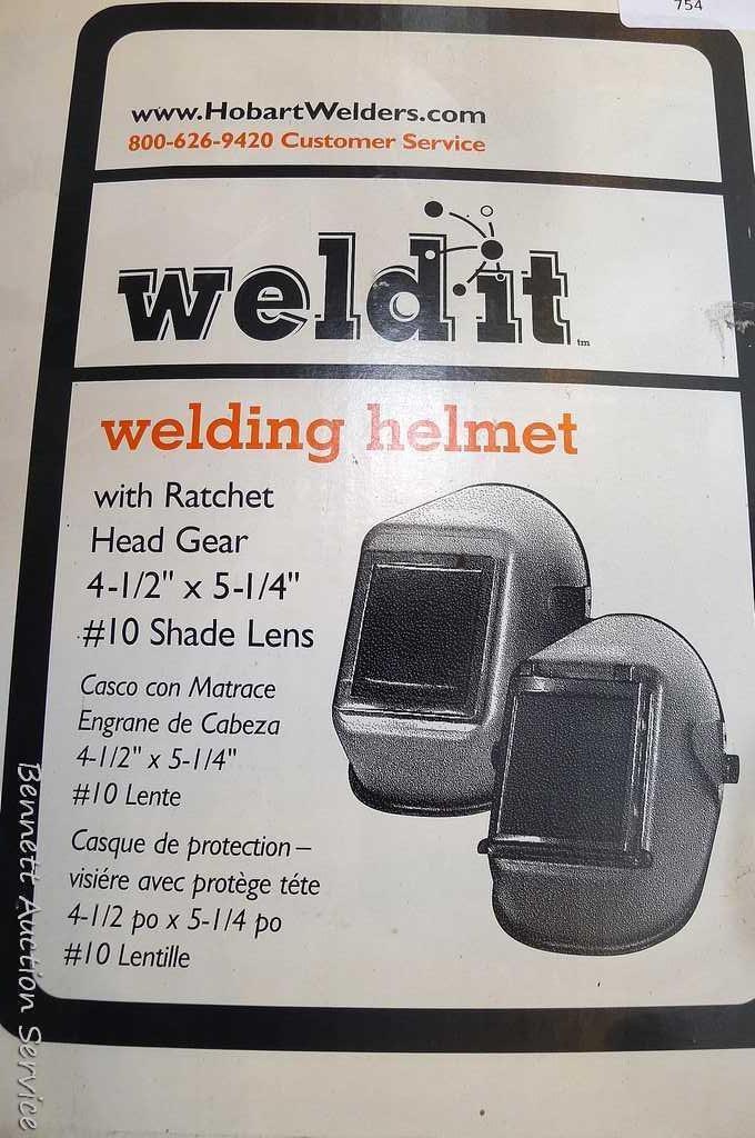 Hobart Weld-It large lens welding helmet with flip up lens and original box.