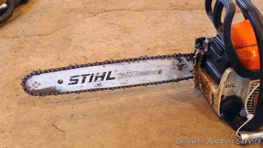 Stihl MS 170 chainsaw with 16" bar, bar cover, manual and wrench. Grip safety was wrapped with tape