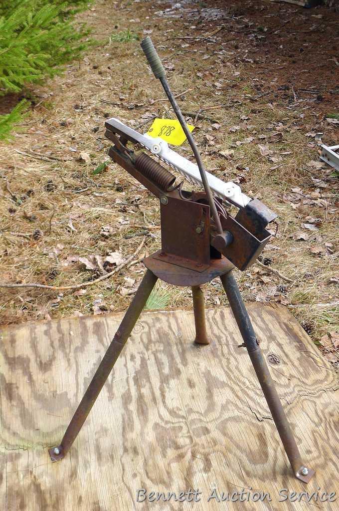 Free standing clay pigeon thrower is mounted on approx. 4'x4' piece of plywood for stability. Bird