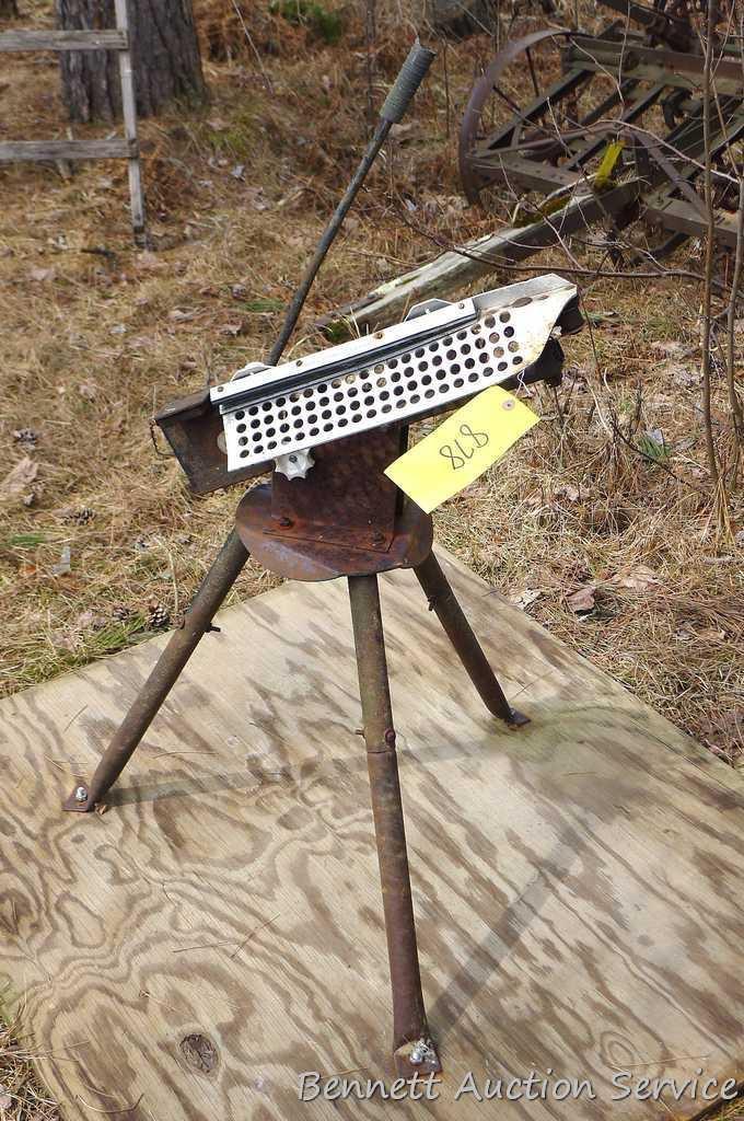 Free standing clay pigeon thrower is mounted on approx. 4'x4' piece of plywood for stability. Bird