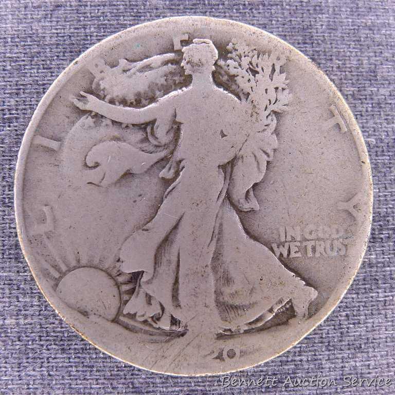 Six Walking Liberty silver half dollars including 1917, 1918-S, 1920, 1928-S and 1940.