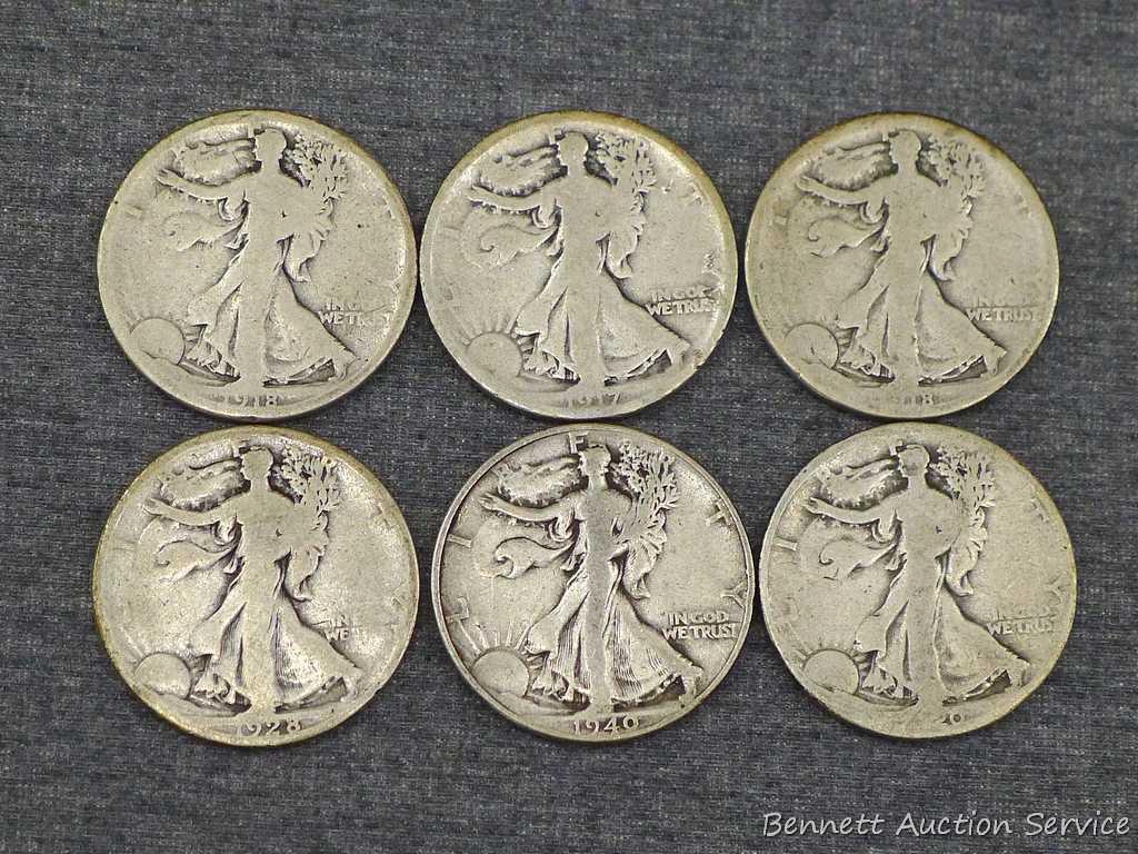 Six Walking Liberty silver half dollars including 1917, 1918-S, 1920, 1928-S and 1940.