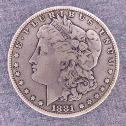 1881-S Morgan silver dollar. Pleasant uniform toning.