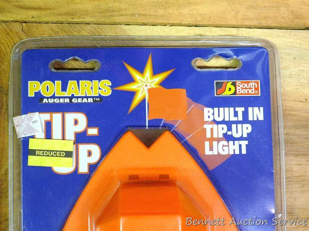 2 NIP Polaris tip-ups; NIP Original Deluxe Polar tip-up; and ice scoop.