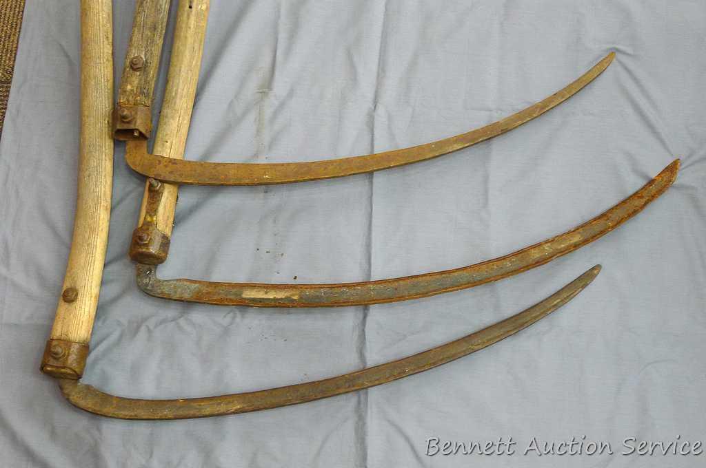 3 Vintage scythes are approx. 5' x 30". One is missing handles and one has a broken tip.