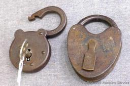 Antique iron padlocks up to 3-1/4" closed. One is marked 'O-K Six Lever' comes with key and works.