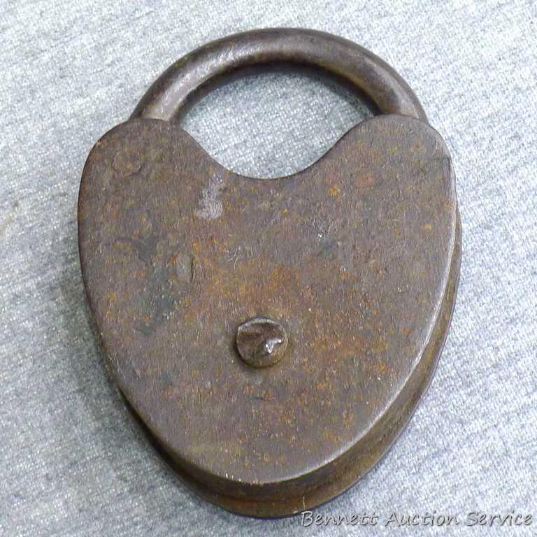 Antique iron padlocks up to 3-1/4" closed. One is marked 'O-K Six Lever' comes with key and works.