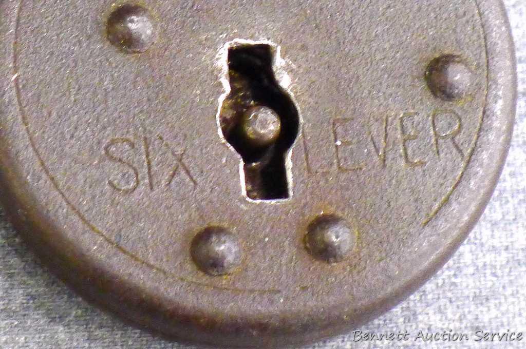 Antique iron padlocks up to 3-1/4" closed. One is marked 'O-K Six Lever' comes with key and works.