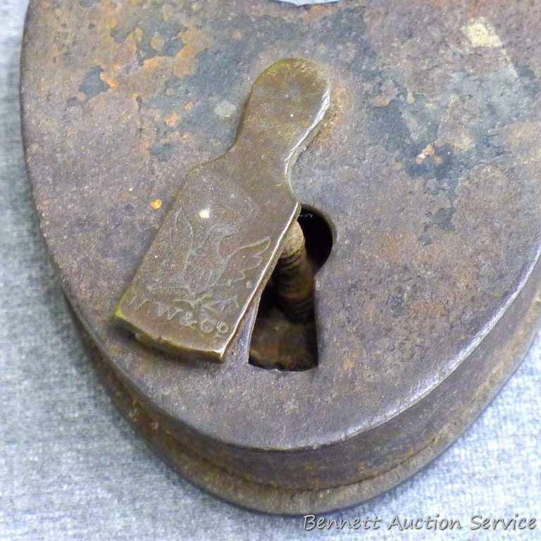 Antique iron padlocks up to 3-1/4" closed. One is marked 'O-K Six Lever' comes with key and works.