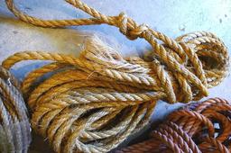 Three hanks of rope up to 1/2" diameter. Two are natural fiber, one is synthetic.