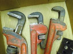 Ridgid 10" and 14" pipe wrenches, plus other 10" pipe wrench and a scraper. Jaws are in good shape.