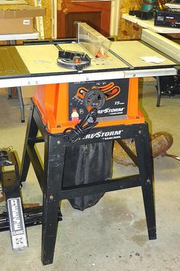 Black and Decker FireStorm 10" table saw with steel floor stand and dust collection bag. Table with