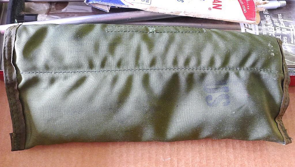 Military gun cleaning kit. Pouch is marked US. Appears complete. Also included is an Otter's rifle