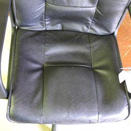 Office chair with adjustable height. Very comfortable and rolls nice.
