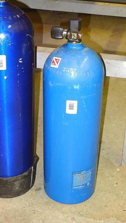 Aluminum scuba tank, 63 cu. inch capacity, has been emptied to allow shipping. Approx. 25" with valv